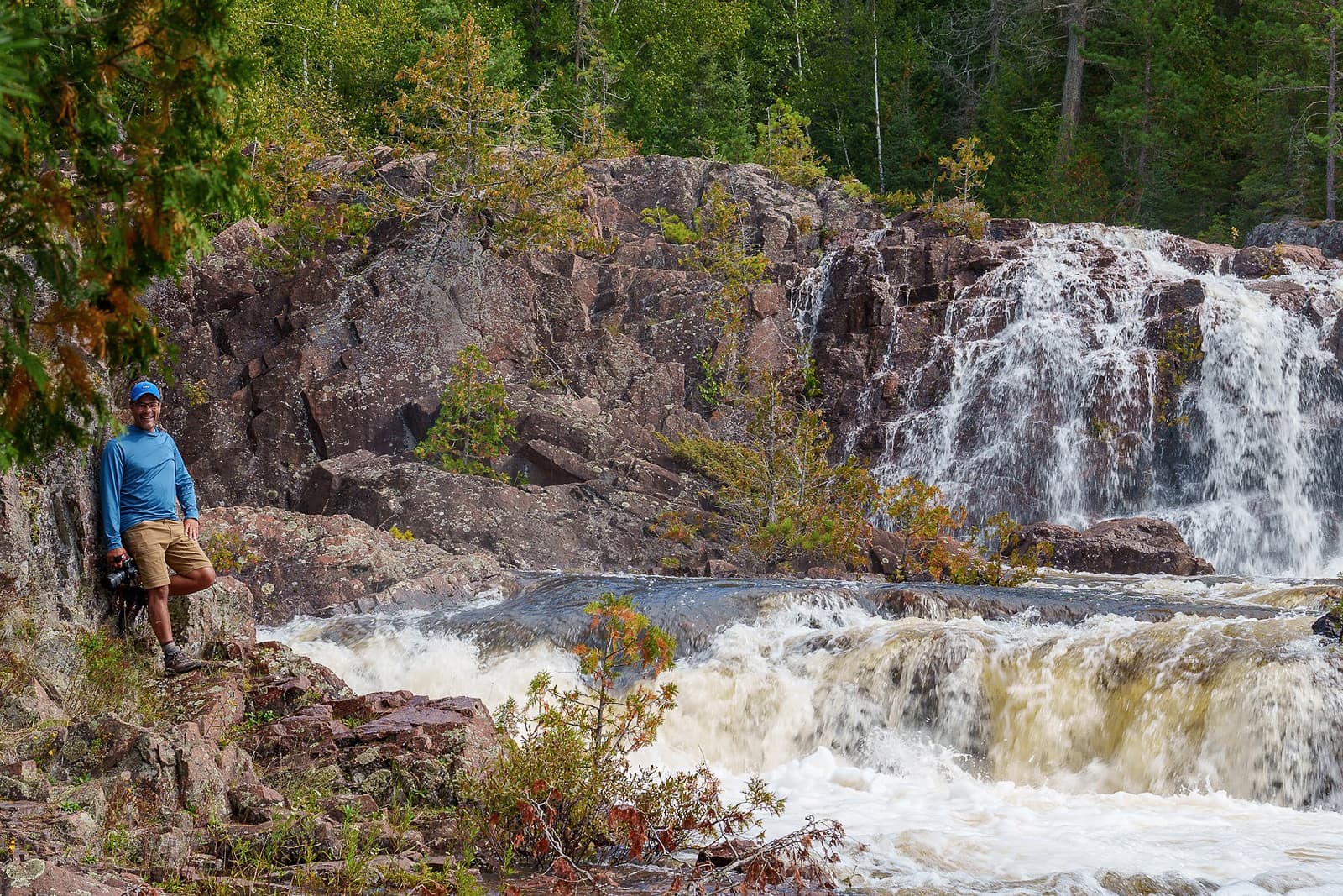 Jay standing beside Aubrey Falls in Algoma