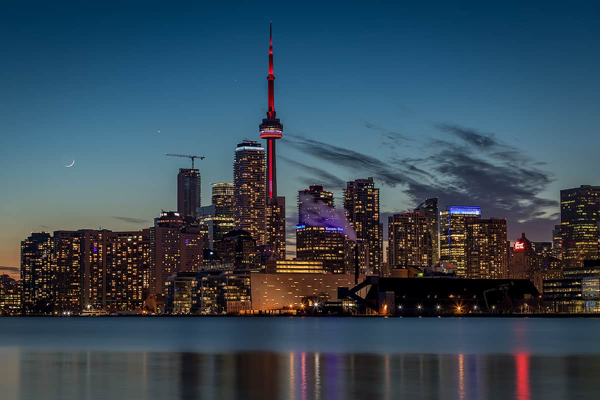 Crescent moon over Toronto skyline