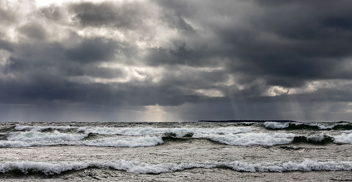 Spring storm with white caps and dramatic light on Lake Superior